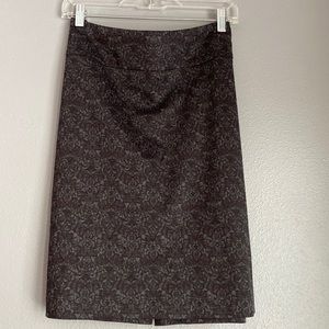 Dark grey stretchy pencil skirt with burgundy print